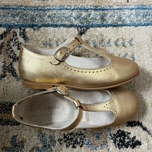La Coqueta Gold T Bar Dress Shoes